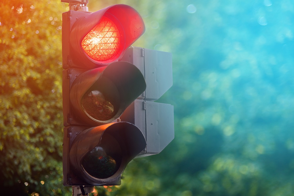 Red light of traffic lights in summer city control lamp concept | Barr ...